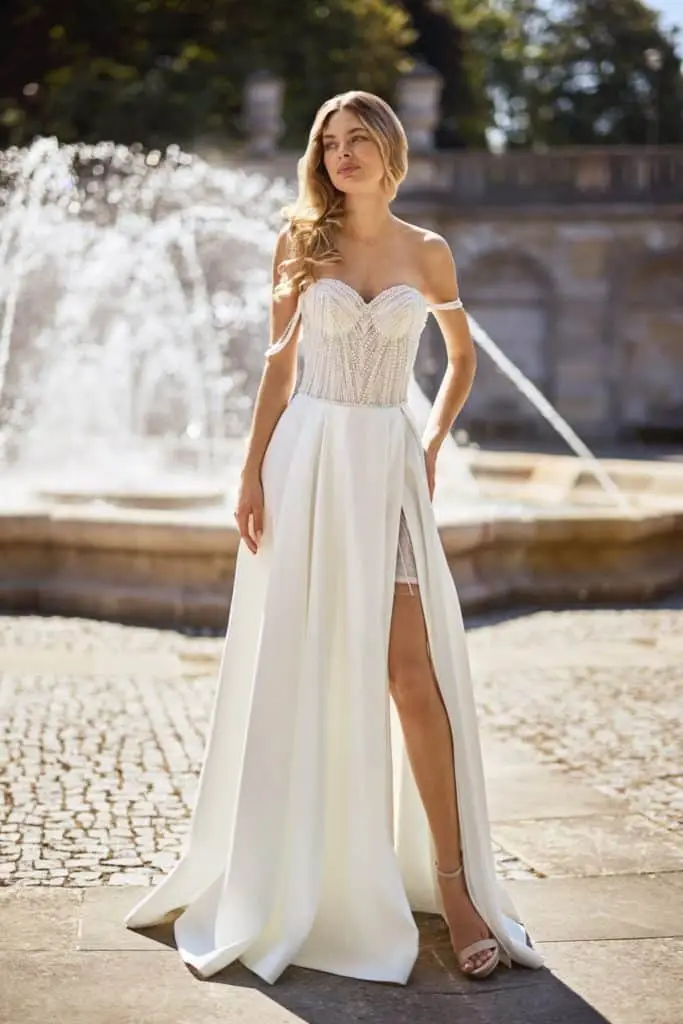 herms bridal_brautatelier ried_isgheria_32439_brautkleid_satin_glitzer_perlenoberteil_a-linie_perlentraeger_ivory_vorne_1_ohnelogo-min herms bridal_brautatelier ried_isgheria_32439_brautkleid_satin_glitzer_perlenoberteil_a-linie_perlentraeger_ivory_vorne_1_ohnelogo-min